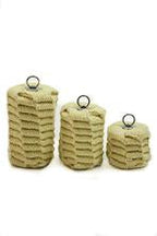 Set of rope dart wick heads, tan cylinders with metal loops in three sizes