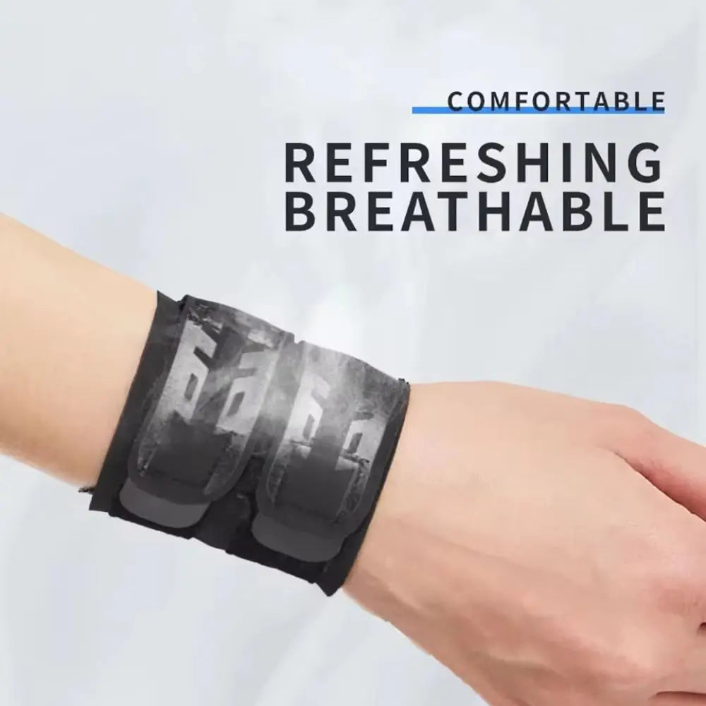 Black breathable wrist brace pair with gray logo pattern on a forearm
