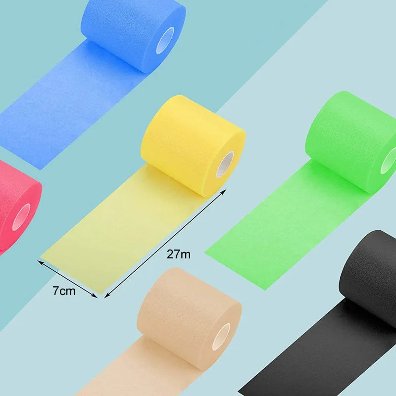 Foam underwrap tape rolls in blue, yellow, green, tan, and black with lengths extended