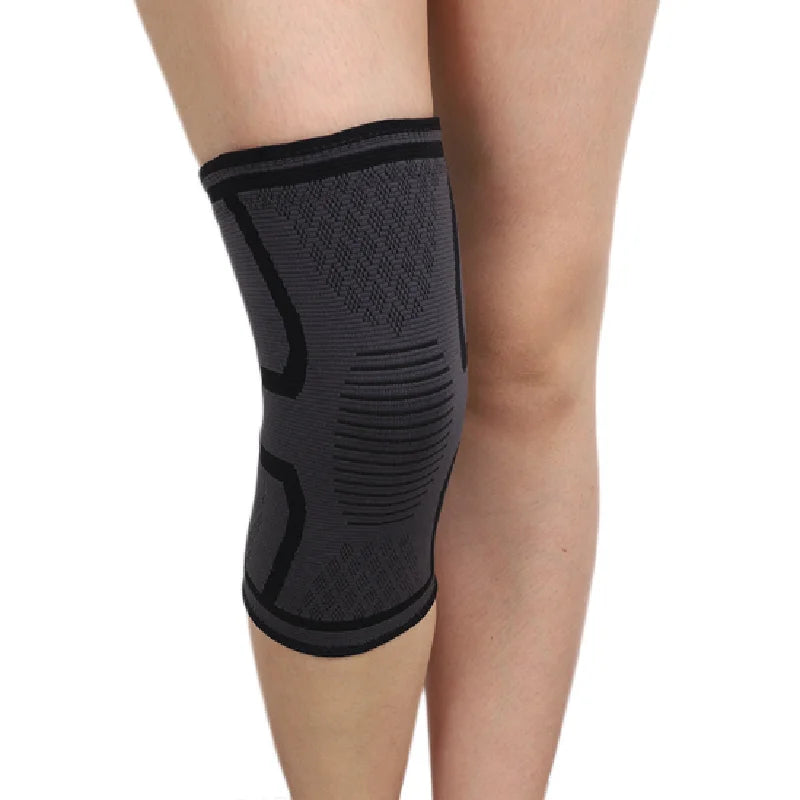 Black knee sleeve with minimal curved design and ribbed compression panels.