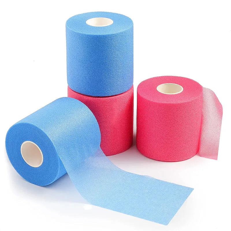 Blue foam underwrap tape strip with stacked blue and pink rolls; visible cores
