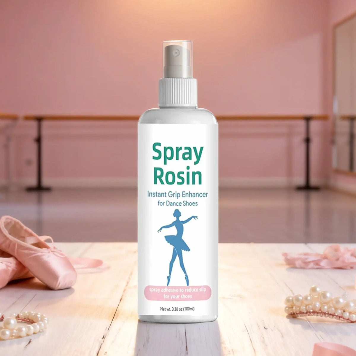 White rosin grip spray bottle with pump, shown with pale ballet shoes and beads