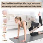 Resistance band around thighs during kneeling hip workout