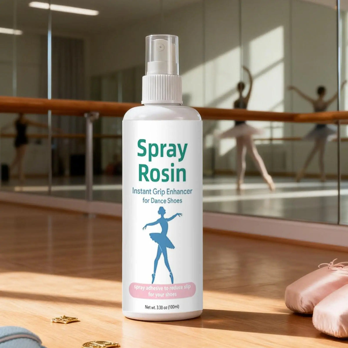 White rosin grip spray bottle with pump standing on a dance studio floor