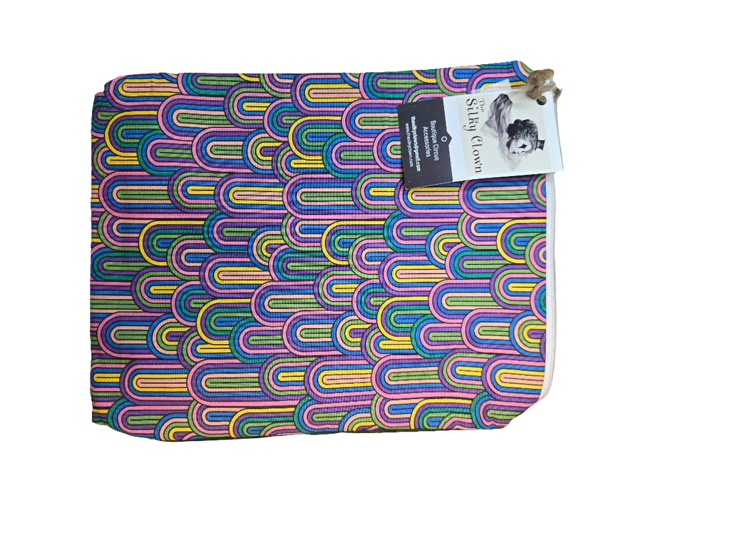 Handmade cloth gear bag with colorful rainbow wave pattern and fabric handle tab